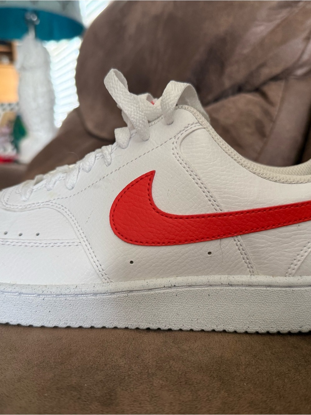 Nike Men’s White Sneakers with Red Swoosh